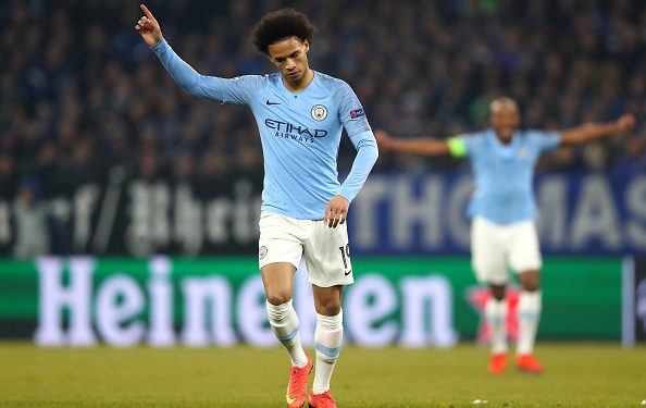 GELSENKIRCHEN, GERMANY - FEBRUARY 20:  Leroy Sane of Manchester City celebrates after scoring his team's second goal during the UEFA Champions League Round of 16 First Leg match between FC Schalke 04 and Manchester City at Veltins-Arena on February 20, 2019 in Gelsenkirchen, Germany.  (Photo by Dean Mouhtaropoulos/Bongarts/Getty Images)