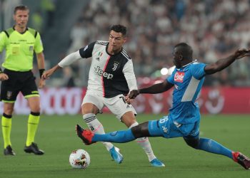 TURIN, ITALY - AUGUST 31:  Cristiano Ronaldo of Juventus is challenged by Kalidou Koulibaly of SSC Napoli during the Serie A match between Juventus and SSC Napoli at Allianz Stadium on August 31, 2019 in Turin, Italy.  (Photo by Emilio Andreoli/Getty Images )