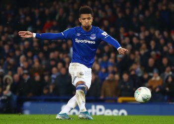 LIVERPOOL, ENGLAND - DECEMBER 18: Mason Holgate of Everton scores in the penalty shoot-out during the Carabao Cup Quarter Final match between Everton FC and Leicester FC at Goodison Park on December 18, 2019 in Liverpool, England. (Photo by Chris Brunskill/Fantasista/Getty Images)