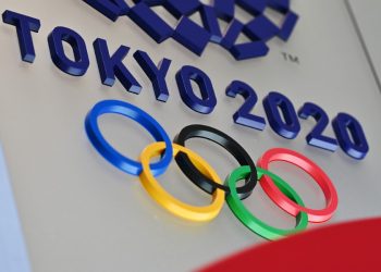 TOPSHOT - The logo for the Tokyo 2020 Olympic Games is seen in Tokyo on March 15, 2020. (Photo by CHARLY TRIBALLEAU / AFP)
