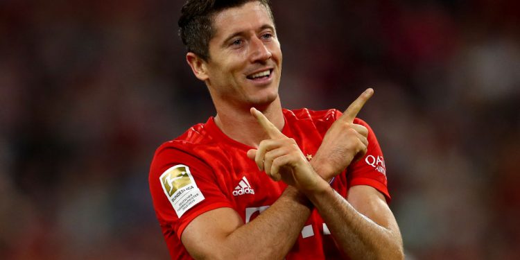 MUNICH, GERMANY - AUGUST 16: Robert Lewandowski of Muenchen celebrates after scoring his teams first goal during the Bundesliga match between FC Bayern Muenchen and Hertha BSC at Allianz Arena on August 16, 2019 in Munich, Germany. (Photo by Lars Baron/Bongarts/Getty Images)