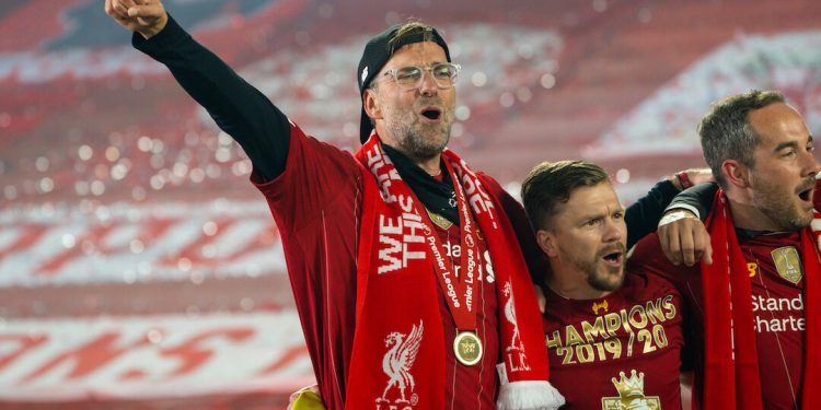 LIVERPOOL, ENGLAND - Wednesday, July 22, 2020: Liverpool’s manager Jürgen Klopp sings "You'll Never Walk Alone" with his staff and players after receiving being crowned Premier League champions after the FA Premier League match between Liverpool FC and Chelsea FC at Anfield. The game was played behind closed doors due to the UK government’s social distancing laws during the Coronavirus COVID-19 Pandemic. Liverpool won 5-3. (Pic by David Rawcliffe/Propaganda)