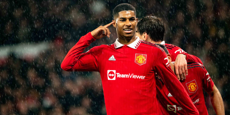 MANCHESTER, ENGLAND - JANUARY 03:  Marcus Rashford of Manchester United celebrates scoring a goal to make the score 3-0 during the Premier League match between Manchester United and AFC Bournemouth at Old Trafford on January 3, 2023 in Manchester, United Kingdom. (Photo by Ash Donelon/Manchester United via Getty Images)