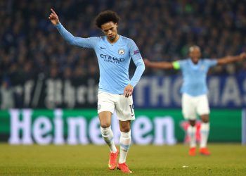 GELSENKIRCHEN, GERMANY - FEBRUARY 20:  Leroy Sane of Manchester City celebrates after scoring his team's second goal during the UEFA Champions League Round of 16 First Leg match between FC Schalke 04 and Manchester City at Veltins-Arena on February 20, 2019 in Gelsenkirchen, Germany.  (Photo by Dean Mouhtaropoulos/Bongarts/Getty Images)
