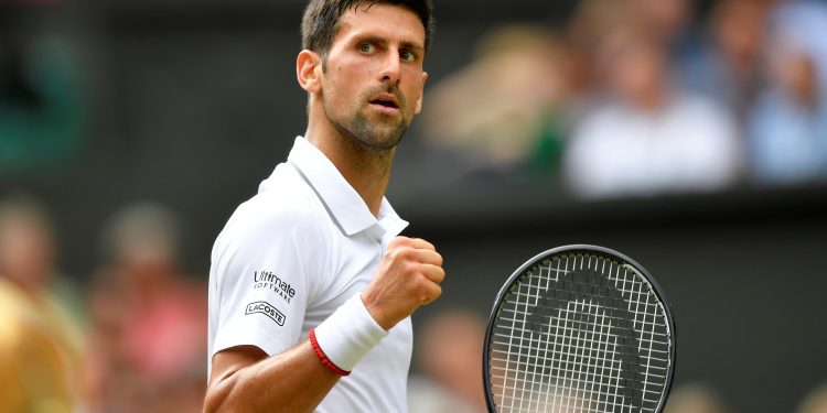 Tennis - Wimbledon - All England Lawn Tennis and Croquet Club, London, Britain - July 12, 2019  Serbia's Novak Djokovic reacts during his semi-final match against Spain's Roberto Bautista Agut  REUTERS/Toby Melville