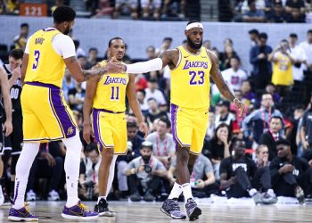 SHENZHEN, CHINA - OCTOBER 12:#23  LeBron James, #3 Anthony Davis and #11 Avery Bradley of the Los Angeles Lakers celebrate during the match against the Brooklyn Nets during a preseason game as part of 2019 NBA Global Games China at Shenzhen Universiade Center on October 12, 2019 in Shenzhen, Guangdong, China. (Photo by Zhong Zhi/Getty Images)