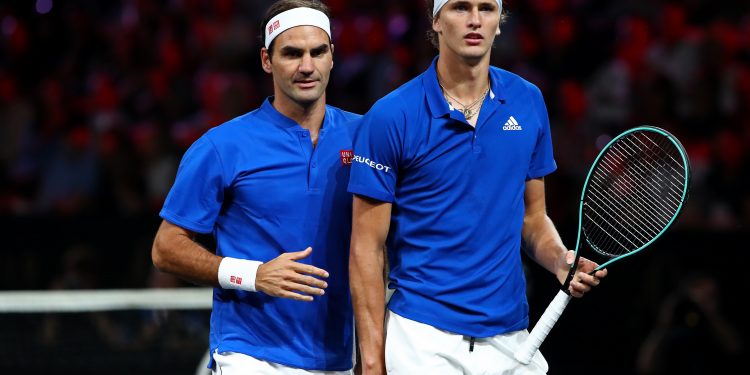 GENEVA, SWITZERLAND - SEPTEMBER 20: Roger Federer and Alexander Zverev of Team Europe look on during their doubles match against Jack Sock and Denis Shapovalov of Team World during Day One of the Laver Cup 2019 at Palexpo on September 20, 2019 in Geneva, Switzerland. The Laver Cup will see six players from the rest of the World competing against their counterparts from Europe. Team World is captained by John McEnroe and Team Europe is captained by Bjorn Borg. The tournament runs from September 20-22.  (Photo by Julian Finney/Getty Images for Laver Cup)