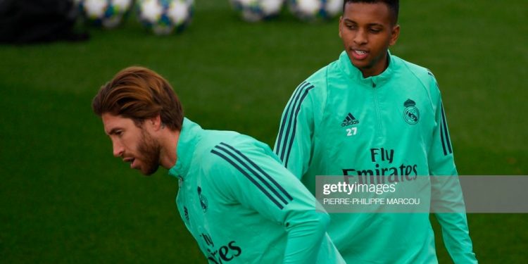 Real Madrid's Spanish defender Sergio Ramos (L) and Real Madrid's Brazilian forward Rodrygo attend a training session at the Real Madrid City in Madrid on November 5, 2019 on the eve of the UEFA Champions League group A football match between Real Madrid CF and Galatasaray SK. (Photo by PIERRE-PHILIPPE MARCOU / AFP) (Photo by PIERRE-PHILIPPE MARCOU/AFP via Getty Images)