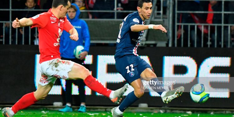 Paris Saint-Germain's Argentine midfielder Angel Di Maria (R) vies for the ball with Brest's French midfielder Julien Faussurier during the French L1 football match between Stade Brestois 29 and Paris Saint-Germain in Brest, western France, on November 9, 2019. (Photo by Damien MEYER / AFP) (Photo by DAMIEN MEYER/AFP via Getty Images)