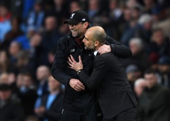 MANCHESTER, ENGLAND - MARCH 19:  Jurgen Klopp, Manager of Liverpool (L) and Josep Guardiola, Manager of Manchester City (R) embrace after the Premier League match between Manchester City and Liverpool at Etihad Stadium on March 19, 2017 in Manchester, England.  (Photo by Michael Regan/Getty Images)