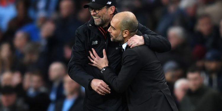 MANCHESTER, ENGLAND - MARCH 19:  Jurgen Klopp, Manager of Liverpool (L) and Josep Guardiola, Manager of Manchester City (R) embrace after the Premier League match between Manchester City and Liverpool at Etihad Stadium on March 19, 2017 in Manchester, England.  (Photo by Michael Regan/Getty Images)