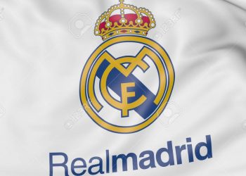 Close-up of waving flag with Real Madrid C.F. football club emblem Russian Federation