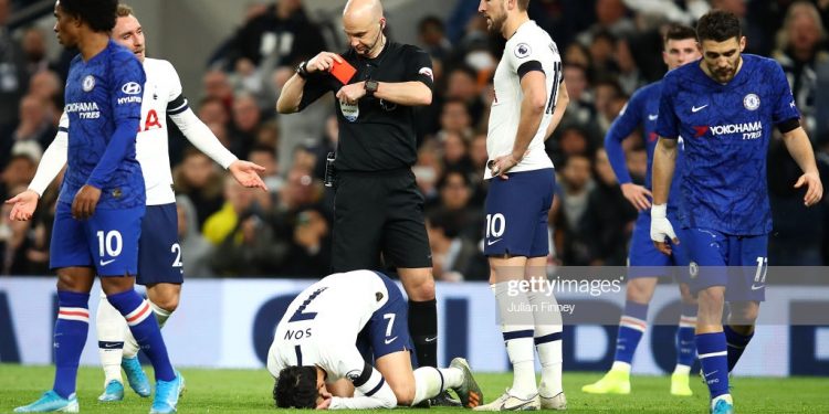 LONDON, ENGLAND - DECEMBER 22:  Heung-Min Son of Tottenham Hotspur is shown a red card by Anthony Taylor during the Premier League match between Tottenham Hotspur and Chelsea FC at Tottenham Hotspur Stadium on December 22, 2019 in London, United Kingdom. (Photo by Julian Finney/Getty Images)