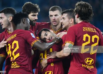 AS Roma's Armenian midfielder Henrik Mkhitaryan (C) celebrates with teammates after scoring during the Italian Serie A football match AS Roma vs Spal on December 15, 2019 at the Olympic stadium in Rome. (Photo by Andreas SOLARO / AFP) (Photo by ANDREAS SOLARO/AFP via Getty Images)