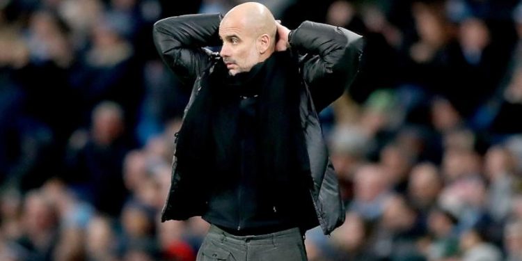 Manchester City manager Pep Guardiola appears dejected during the Premier League match at the Etihad Stadium, Manchester. PA Photo. Picture date: Saturday December 7, 2019. See PA story SOCCER Man City. Photo credit should read: Martin Rickett/PA Wire. RESTRICTIONS: EDITORIAL USE ONLY No use with unauthorised audio, video, data, fixture lists, club/league logos or "live" services. Online in-match use limited to 120 images, no video emulation. No use in betting, games or single club/league/player publications.