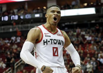 HOUSTON, TX - DECEMBER 07:  Russell Westbrook #0 of the Houston Rockets reacts after a basket in the fourth quarter against the Phoenix Suns at Toyota Center on December 7, 2019 in Houston, Texas.  NOTE TO USER: User expressly acknowledges and agrees that, by downloading and or using this photograph, User is consenting to the terms and conditions of the Getty Images License Agreement.  (Photo by Tim Warner/Getty Images)