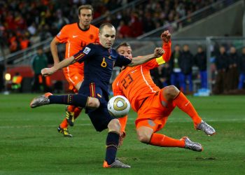 JOHANNESBURG, SOUTH AFRICA - JULY 11:  Andres Iniesta of Spain scores the winning goal during the 2010 FIFA World Cup South Africa Final match between Netherlands and Spain at Soccer City Stadium on July 11, 2010 in Johannesburg, South Africa.  (Photo by Lars Baron/Getty Images)
