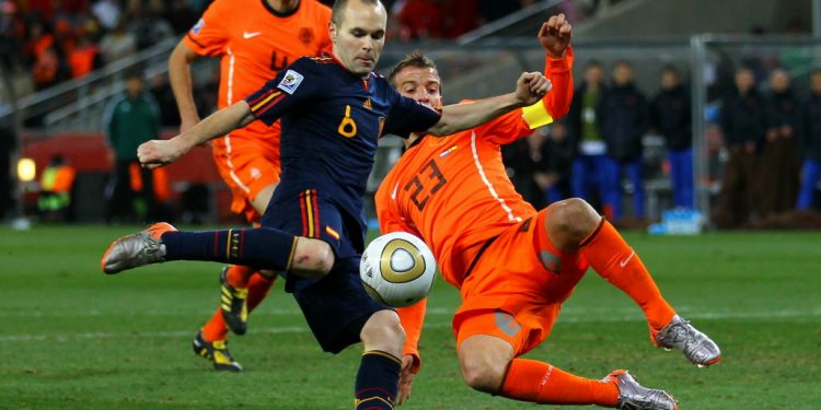 JOHANNESBURG, SOUTH AFRICA - JULY 11:  Andres Iniesta of Spain scores the winning goal during the 2010 FIFA World Cup South Africa Final match between Netherlands and Spain at Soccer City Stadium on July 11, 2010 in Johannesburg, South Africa.  (Photo by Lars Baron/Getty Images)