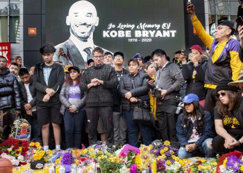 Fans gather outside Staples Center in Los Angeles upon hearing news of his death