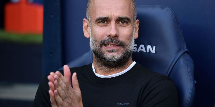 Manchester City's Spanish manager Pep Guardiola reacts ahead of the English Premier League football match between Manchester City and Tottenham Hotspur at the Etihad Stadium in Manchester, north west England, on August 17, 2019. (Photo by Oli SCARFF / AFP) / RESTRICTED TO EDITORIAL USE. No use with unauthorized audio, video, data, fixture lists, club/league logos or 'live' services. Online in-match use limited to 120 images. An additional 40 images may be used in extra time. No video emulation. Social media in-match use limited to 120 images. An additional 40 images may be used in extra time. No use in betting publications, games or single club/league/player publications. /         (Photo credit should read OLI SCARFF/AFP/Getty Images)