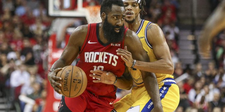 Nov 6, 2019; Houston, TX, USA; Houston Rockets guard James Harden (13) dribbles the ball as Golden State Warriors guard Damion Lee (1) defends during the third quarter at Toyota Center. Mandatory Credit: Troy Taormina-USA TODAY Sports