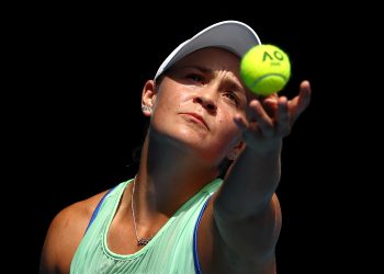 MELBOURNE, AUSTRALIA - JANUARY 24:  Ashleigh Barty of Australia serves during her Women's Singles third round match against Elena Rybakina of Kazakhstan on day five of the 2020 Australian Open at Melbourne Park on January 24, 2020 in Melbourne, Australia. (Photo by Kelly Defina/Getty Images)