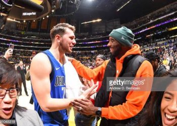 LOS ANGELES, CA - DECEMBER 29:  Luka Doncic #77 of the Dallas Mavericks and Kobe Bryant high five after the game against the Los Angeles Lakers on December 29, 2019 at STAPLES Center in Los Angeles, California. NOTE TO USER: User expressly acknowledges and agrees that, by downloading and/or using this Photograph, user is consenting to the terms and conditions of the Getty Images License Agreement. Mandatory Copyright Notice: Copyright 2019 NBAE (Photo by Andrew D. Bernstein/NBAE via Getty Images)