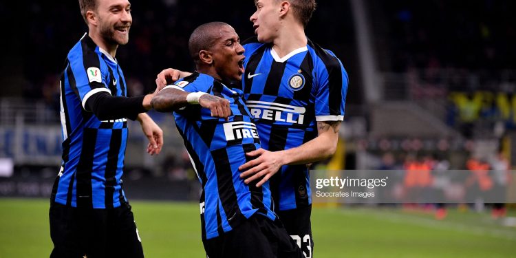 MILAN, ITALY - JANUARY 29:  (L-R) Nicolo Barella of Inter celebrates 2-1 with Ashley Young of Inter, Christian Eriksen of Inter  during the Italian Coppa Italia  match between Internazionale v Fiorentina at the San Siro on January 29, 2020 in Milan Italy (Photo by Mattia Ozbot/Soccrates/Getty Images)