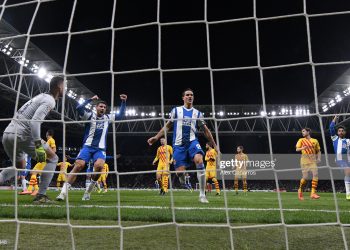 BARCELONA, SPAIN - JANUARY 04: Jonathan Calleri and Bernardo Espinosa of Espanyol celebrate as David Lopez of Espanyol (obscured) celebrates scoring his team's first goal during the La Liga match between RCD Espanyol and FC Barcelona at RCDE Stadium on January 04, 2020 in Barcelona, Spain. (Photo by Alex Caparros/Getty Images)
