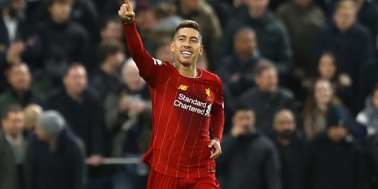 LONDON, ENGLAND - JANUARY 11: Roberto Firmino of Liverpool celebrates after scoring his team's first goal during the Premier League match between Tottenham Hotspur and Liverpool FC at Tottenham Hotspur Stadium on January 11, 2020 in London, United Kingdom. (Photo by Richard Heathcote/Getty Images)