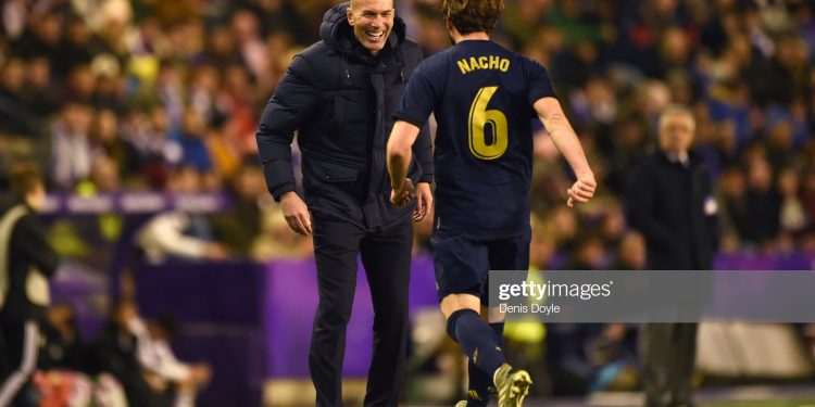 VALLADOLID, SPAIN - JANUARY 26:  Nacho Fernandez of Real Madrid (6) celebrates with Zinedine Zidane, Manager of Real Madrid as scores his team's first goal during the Liga match between Real Valladolid CF and Real Madrid CF at Jose Zorrilla on January 26, 2020 in Valladolid, Spain. (Photo by Denis Doyle/Getty Images)