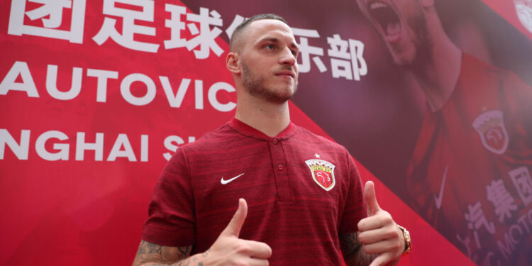 Austrian player Marko Arnautovic poses at an event held to introduce him as a new player for Chinese Super League football team Shanghai SIPG, in Shanghai on July 11, 2019. - Arnautovic completed a move from West Ham to Shanghai SIPG on July 9. (Photo by STR / AFP) / China OUT        (Photo credit should read STR/AFP via Getty Images)
