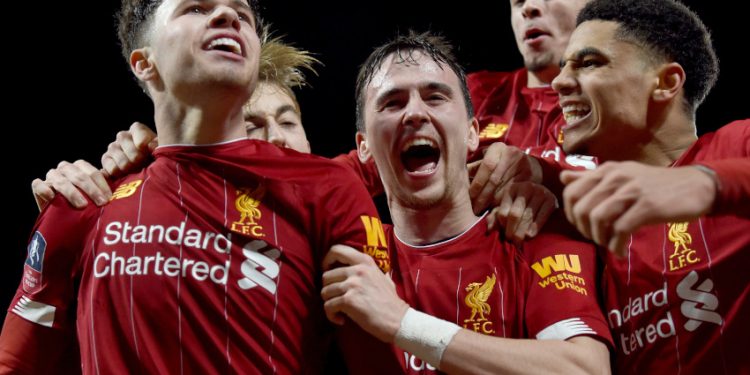LIVERPOOL, ENGLAND - FEBRUARY 04: (THE SUN OUT, THE SUN ON SUNDAY OUT) Liam Millar of Liverpool and Neco Williams of Liverpool with Ki-Jana Hoever of Liverpool celebrates after the opening goal  during the FA Cup Fourth Round Replay match between Liverpool FC and Shrewsbury Town at Anfield on February 04, 2020 in Liverpool, England. (Photo by John Powell/Liverpool FC via Getty Images)
