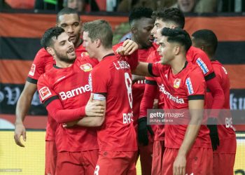 08 February 2020, North Rhine-Westphalia, Leverkusen: Football: Bundesliga, Bayer Leverkusen - Borussia Dortmund, 21st matchday in the BayArena. Leverkusen's Lars Bender (2nd from left) cheers with Kevin Volland about his goal for the 4th place in the 4.3. Photo: Bernd Thissen/dpa - IMPORTANT NOTE: In accordance with the regulations of the DFL Deutsche Fußball Liga and the DFB Deutscher Fußball-Bund, it is prohibited to exploit or have exploited in the stadium and/or from the game taken photographs in the form of sequence images and/or video-like photo series. (Photo by Bernd Thissen/picture alliance via Getty Images)