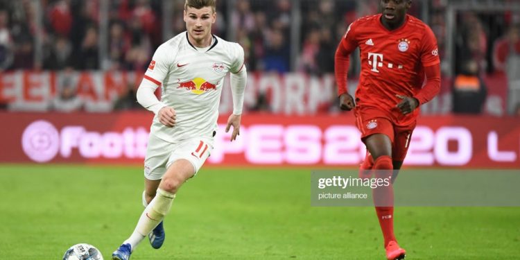 09 February 2020, Bavaria, Munich: Football: Bundesliga, Bayern Munich - RB Leipzig, 21st matchday in the Allianz Arena. Alphonso Davies (r) of Munich in action against Timo Werner of Leipzig. IMPORTANT NOTE: In accordance with the regulations of the DFL Deutsche Fußball Liga and the DFB Deutscher Fußball-Bund, it is prohibited to exploit or have exploited in the stadium and/or from the game taken photographs in the form of sequence images and/or video-like photo series. Photo: Matthias Balk/dpa (Photo by Matthias Balk/picture alliance via Getty Images)