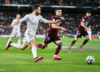MADRID, SPAIN - FEBRUARY 16: Dani Carvajal of Real Madrid controls the ball during the Liga match between Real Madrid CF and RC Celta de Vigo at Estadio Santiago Bernabeu on February 16, 2020 in Madrid, Spain. (Photo by Sonia Canada/Getty Images)