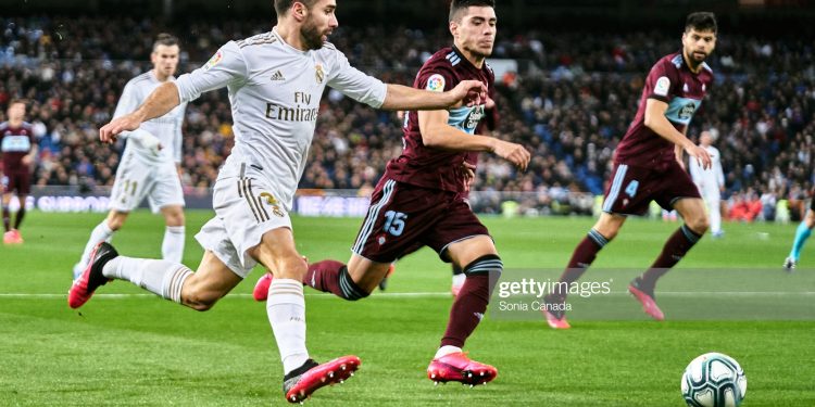 MADRID, SPAIN - FEBRUARY 16: Dani Carvajal of Real Madrid controls the ball during the Liga match between Real Madrid CF and RC Celta de Vigo at Estadio Santiago Bernabeu on February 16, 2020 in Madrid, Spain. (Photo by Sonia Canada/Getty Images)