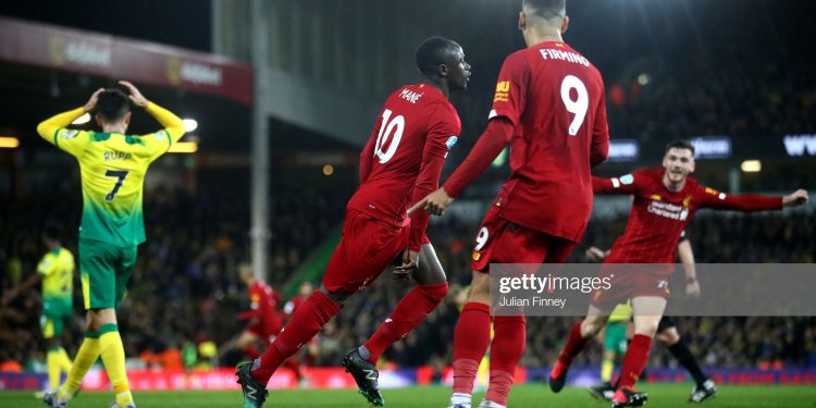NORWICH, ENGLAND - FEBRUARY 15: Sadio Mane of Liverpool celebrates after scoring his team's first goal during the Premier League match between Norwich City and Liverpool FC at Carrow Road on February 15, 2020 in Norwich, United Kingdom. (Photo by Julian Finney/Getty Images)