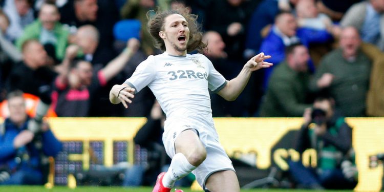 LEEDS, ENGLAND - MARCH 07: Luke Ayling of Leeds United celebrates scoring his team's first goal during the Sky Bet Championship match between Leeds United and Huddersfield Town at Elland Road on March 07, 2020 in Leeds, England. (Photo by John Early/Getty Images)