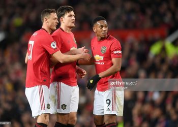 MANCHESTER, ENGLAND - MARCH 08: Nemanja Matic of Manchester United , Harry Maguire of Manchester United and Anthony Martial of Manchester United look on during the Premier League match between Manchester United and Manchester City at Old Trafford on March 08, 2020 in Manchester, United Kingdom. (Photo by Michael Regan/Getty Images)