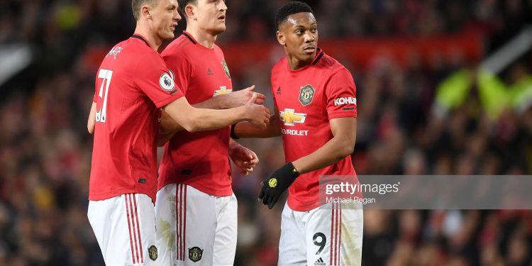MANCHESTER, ENGLAND - MARCH 08: Nemanja Matic of Manchester United , Harry Maguire of Manchester United and Anthony Martial of Manchester United look on during the Premier League match between Manchester United and Manchester City at Old Trafford on March 08, 2020 in Manchester, United Kingdom. (Photo by Michael Regan/Getty Images)