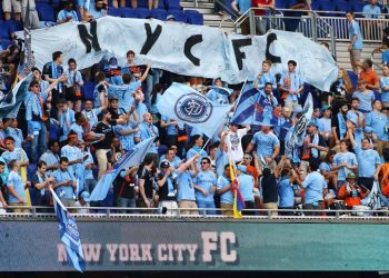 May 10, 2015; Harrison, NJ, USA; Fans of New York City FC cheer their team during pregame warmups prior to the game against the New York Red Bulls at Red Bull Arena. Mandatory Credit: Andy Marlin-USA TODAY Sports