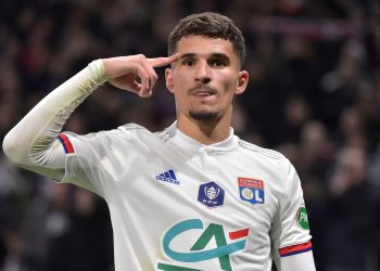 Lyon's French midfielder Houssem Aouar celebrates after scoring the opener during the French Cup quarter-final football match between Olympique Lyonnais and Olympique de Marseille at the Groupama stadium in Decines-Charpieu near Lyon, central eastern France on February 12, 2020. (Photo by ROMAIN LAFABREGUE / AFP) (Photo by ROMAIN LAFABREGUE/AFP via Getty Images)