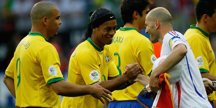 FRANKFURT, GERMANY - JULY 01:  Zinedine Zidane of France shakes hands with Ronaldinho and Ronaldo of Brazil during the FIFA World Cup Germany 2006 Quarter-final match between Brazil and France at the Stadium Frankfurt on July 1, 2006 in Frankfurt, Germany.  (Photo by Stuart Franklin/Bongarts/Getty Images)