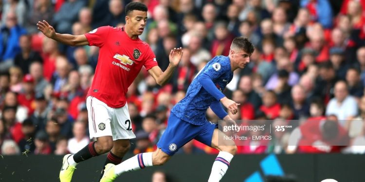 Manchester United's Mason Greenwood (left) and Chelsea's Mason Mount battle for the ball Manchester United v Chelsea - Premier League - Old Trafford 11-08-2019 . (Photo by  Nick Potts/PA Images via Getty Images)