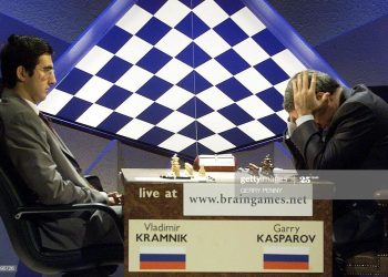 LONDON, UNITED KINGDOM:  Vladimir Kramnik (L) watches reigning world chess champion Garry Kasparov as he ponders over his next move, 31 October 2000, at the Hammersmith Riverside Studios during the  crucial 14th match.   AFP PHOTO   GERRY PENNY (Photo credit should read GERRY PENNY/AFP via Getty Images)