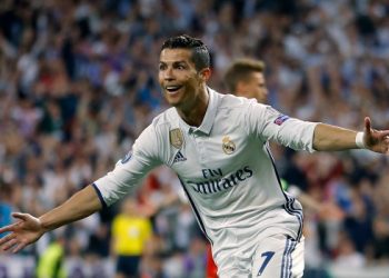 FILE - In this Tuesday, April 18, 2017 file photo, Real Madrid's Cristiano Ronaldo celebrates scoring during the Champions League quarterfinal second leg soccer match between Real Madrid and Bayern Munich at Santiago Bernabeu stadium in Madrid, Spain. The Champions League semifinals begin this week with Spanish rivals Real Madrid and Atletico Madrid meeting for the fourth consecutive time in the European competition, while surprising French club Monaco will try to keep Italian champion Juventus from returning to the final for the second time in three seasons. (AP Photo/Francisco Seco, File)