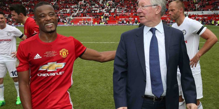 MANCHESTER, ENGLAND - JUNE 04:  Manager Sir Alex Ferguson of Manchester United '08 XI speaks to Patrice Evra after the Michael Carrick Testimonial match between Manchester United '08 XI and Michael Carrick All-Stars at Old Trafford on June 4, 2017 in Manchester, England.  (Photo by John Peters/Man Utd via Getty Images)