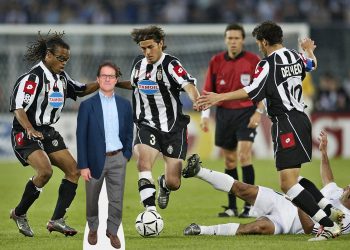 TURIN, ITALY - MAY 14:  Alessio Tacchinardi of Juventus skips through a tackle with team mate Edgar Davids at hand during the UEFA Champions League semi final second leg match between Juventus and Real Madrid on May 14, 2003, at the Stadio Delle Alpi in Turin, Italy. (Photo by Clive Mason/Getty Images)