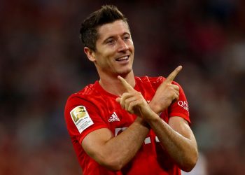 MUNICH, GERMANY - AUGUST 16: Robert Lewandowski of Muenchen celebrates after scoring his teams first goal during the Bundesliga match between FC Bayern Muenchen and Hertha BSC at Allianz Arena on August 16, 2019 in Munich, Germany. (Photo by Lars Baron/Bongarts/Getty Images)